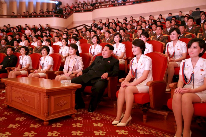 © Reuters. North Korean leader Kim Jong Un and wife Ri Sol Ju enjoy an art performance given by the Chongbong Band to mark the 70th anniversary of the founding of the Workers' Party of Korea (WPK) in this undated KCNA photo