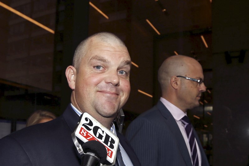 © Reuters. File picture of former Australian billionaire Nathan Tinkler talking to a journalist as he arrives at the New South Wales Supreme Court in central Sydney