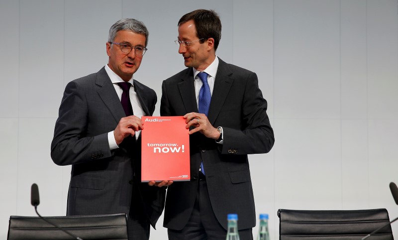 © Reuters. Audi Chief Executive Officer Stadler and Chief Financial Officer Strotbek pose before the company's annual news conference in the Bavarian city of Ingolstadt