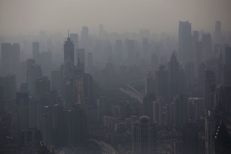 © Reuters. File picture of a view of the city skyline seen from the Shanghai Financial Center building in Shanghai