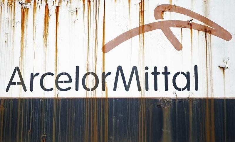 © Reuters. Steel factory ArcelorMittal's logo is seen on an old train in Zenica