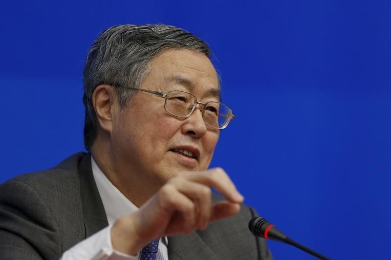 © Reuters. China's central bank governor Zhou Xiaochuan attends a news conference ahead of the meeting of G20 finance ministers and central bank governors in Shanghai