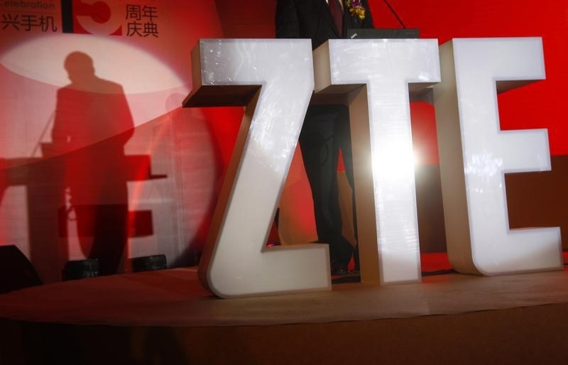 © Reuters. The ZTE company logo is seen as a guest delivers a speech during the company's 15th anniversary celebration in Beijing