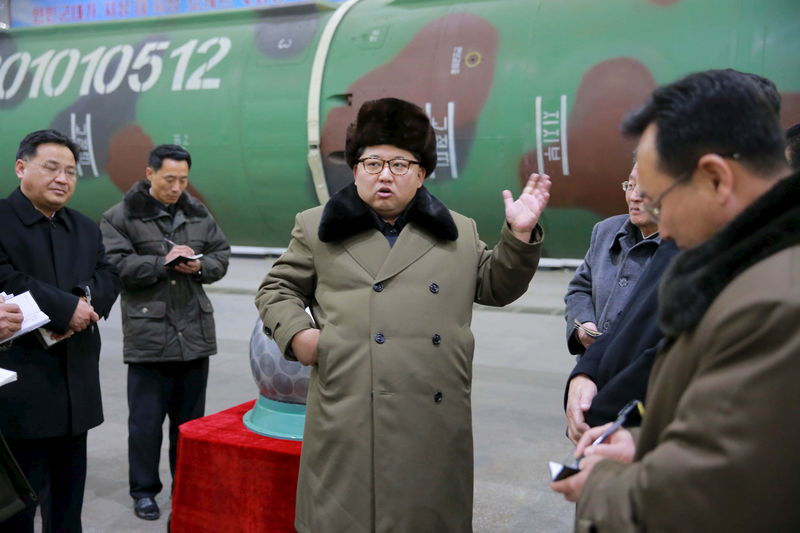 © Reuters. North Korean leader Kim Jong Un meets scientists and technicians in the field of researches into nuclear weapons 