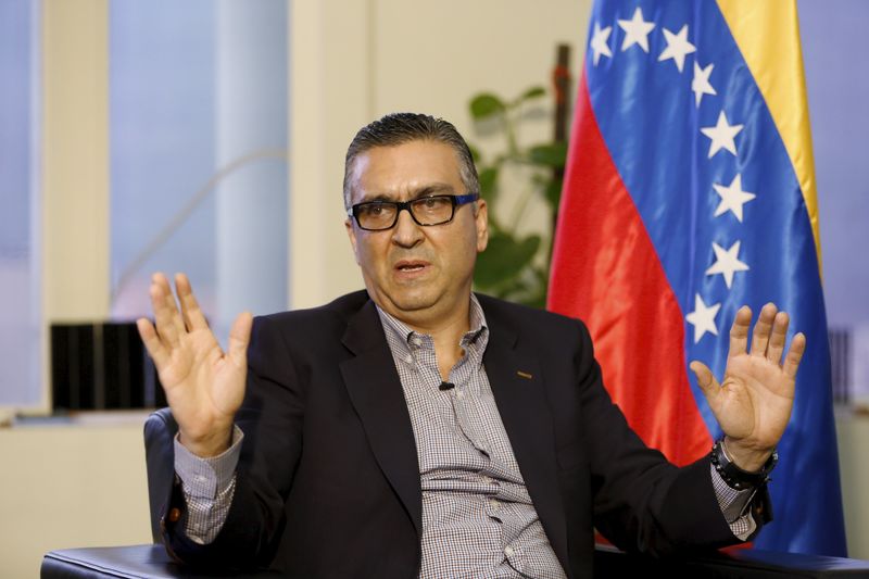 © Reuters. Abad gestures while he speaks during an interview with Reuters in Caracas