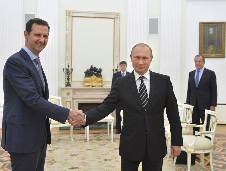 © Reuters. Assad e Putin em reunião em Moscou