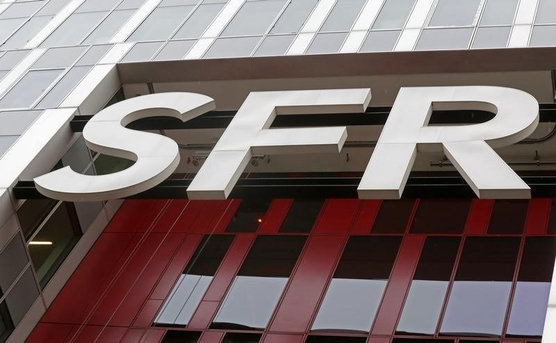 © Reuters. SFR ENRAYE LES PERTES DE CLIENTS