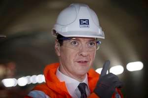 © Reuters. Britain's Chancellor of the Exchequer George Osborne visits the Crossrail station construction site at Tottenham Court Road in central London, Britain