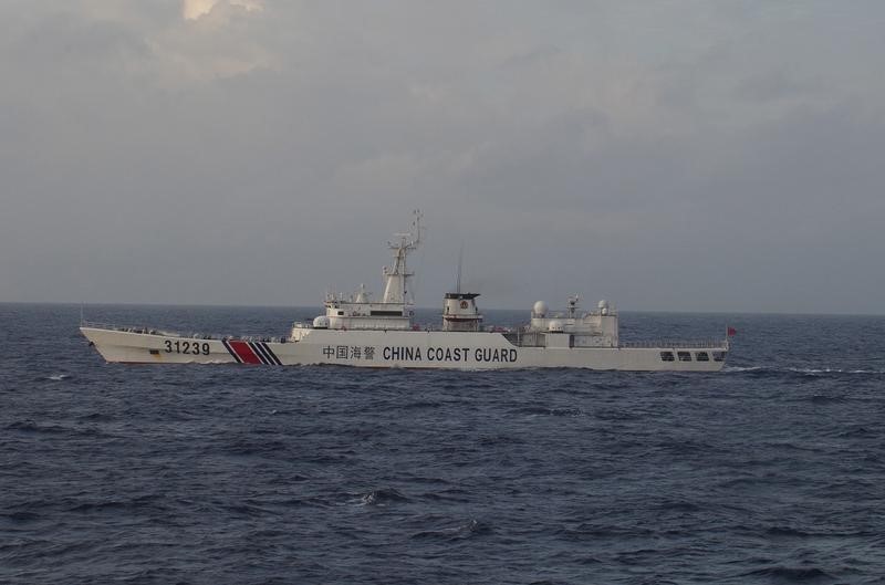 © Reuters. China Coast Guard vessel No. 31239 sails in the East China Sea near the disputed isles known as Senkaku isles in Japan and Diaoyu islands in China