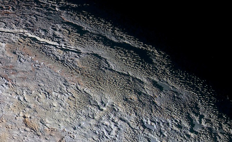 © Reuters. The bladed terrain of Tartarus Dorsa on the dwarf planet Pluto is seen in an undated image from NASA's New Horizons spacecraft