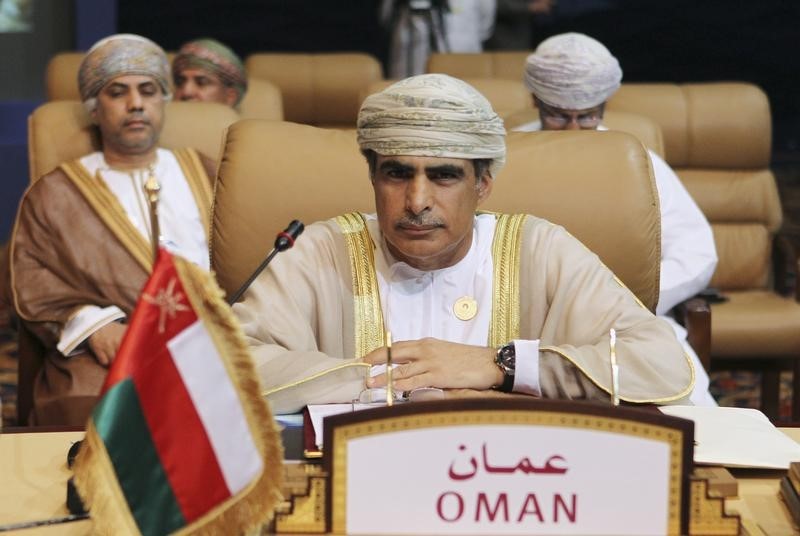 © Reuters. Oman's Oil Minister Mohammad bin Hamad bin Saif al-Rumhi attends during the opening session of the first Gas Exporting Countries Forum summit in Doha