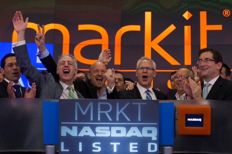 © Reuters. Markit CEO Uggla celebrates during the company's market debut at the Nasdaq stock market in New York
