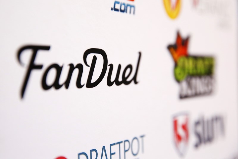 © Reuters. A FanDuel logo is displayed on a board inside of the DFS Players Conference in New York