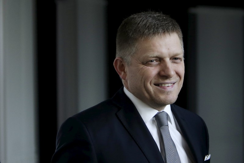 © Reuters. Slovakia's Prime Minister and leader of Smer party Robert Fico leaves after a live broadcast of a debate after the country's parliamentary election, in Bratislava