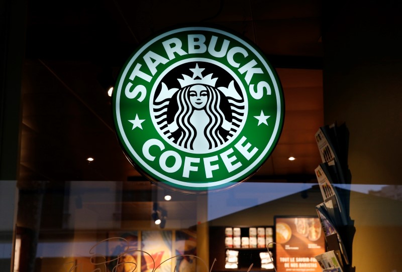 © Reuters. A Starbucks Coffee sign is pictured in Geneva