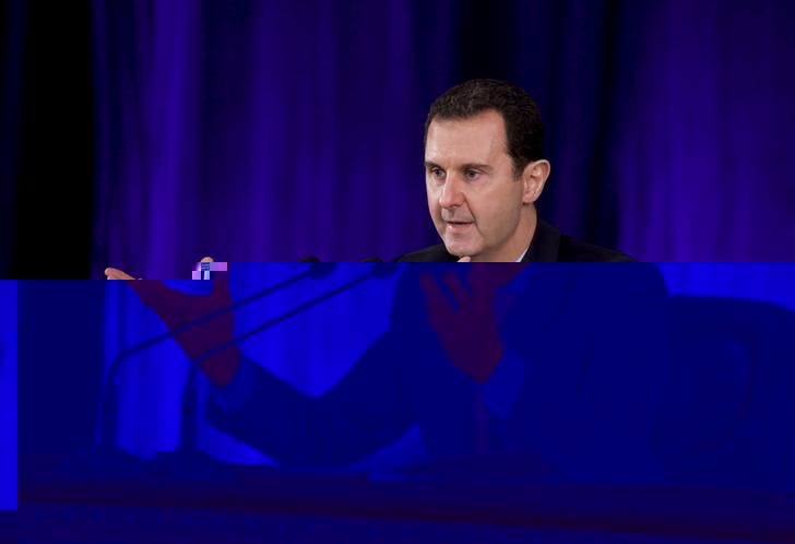 © Reuters. الأسد: قضية تشكيل حكومة سورية جديدة يمكن حلها في جنيف
