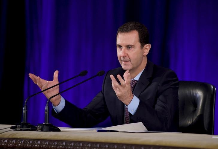 © Reuters. الأسد يقول الدعم الروسي كان محوريا في الانتصارات العسكرية لقواته