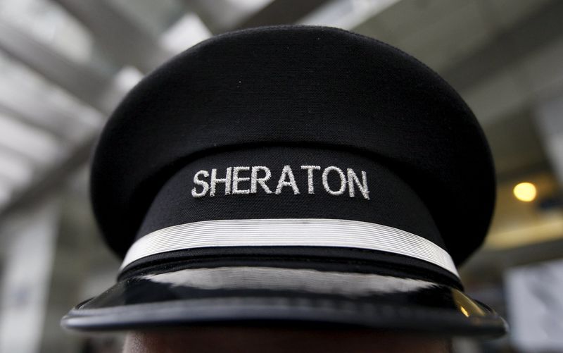 © Reuters. File photo of a doorman's hat at Sheraton hotel, a brand of Starwood Hotels & Resorts Worldwide, in Warsaw