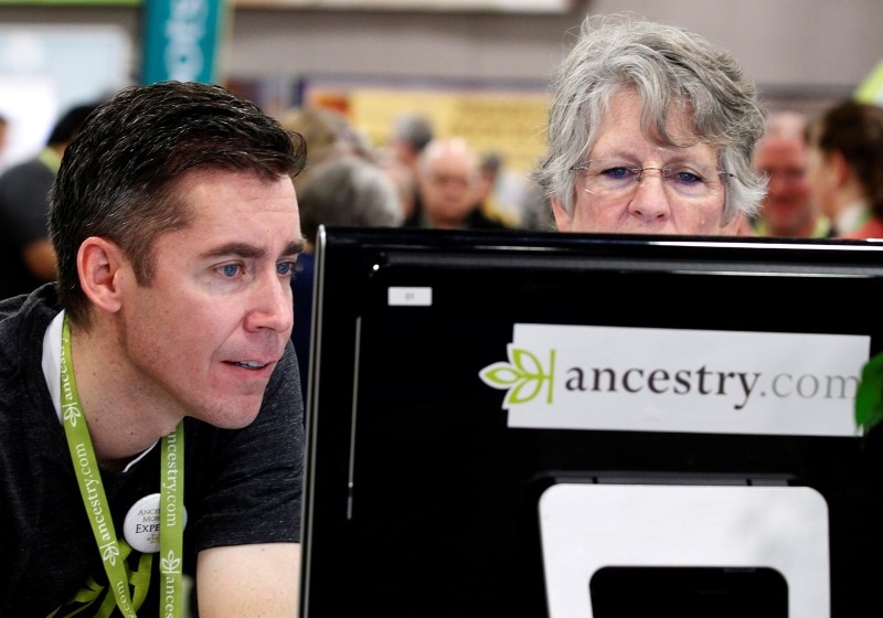 © Reuters. David Reese and Dana Gull try out software at the Ancestry.com booth at the Rootstech Conference, sponsored by Family Search, in Salt Lake City