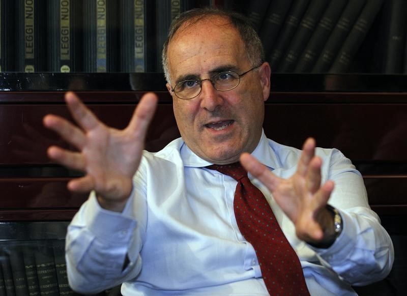 © Reuters. UBI Bank CEO Victor Massiah gestures during an interview with Reuters in downtown Milan