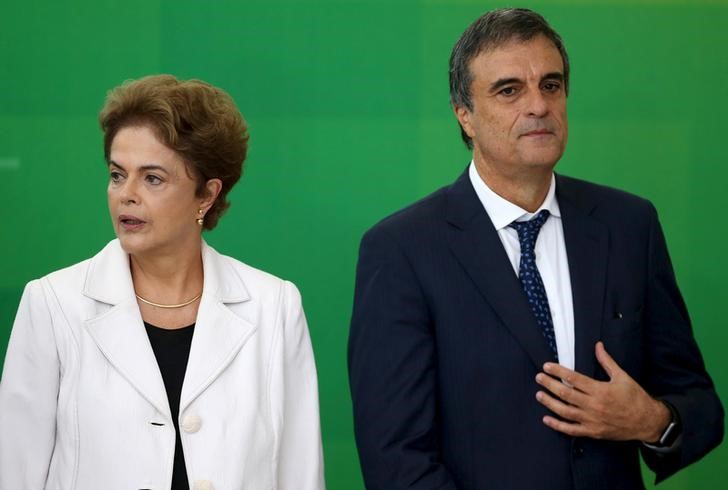 © Reuters. Brazil's new General Attorney Cardozo attends his inauguration ceremony next to Brazil's President Dilma Rousseff at Planalto Palace in Brasilia