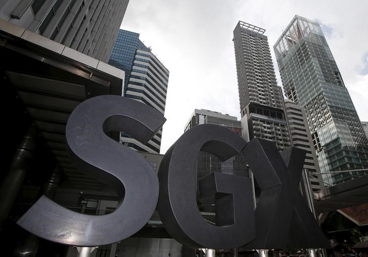 © Reuters. A Singapore Exchange (SGX) sign sits outside its premises at the central business district in Singapore 