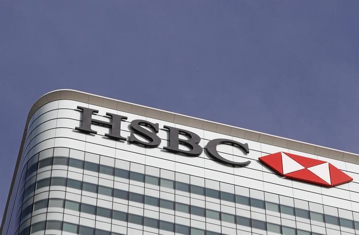 © Reuters. The HSBC logo is seen at their offices at Canary Wharf financial district in London