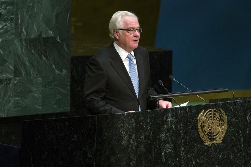 © Reuters. Russian Ambassador to the United Nations Vitaly Churkin speaks before a United Nations General Assembly vote addressing the economic, commercial and financial embargo imposed by the U.S. against Cuba at the United Nations headquarters in New York