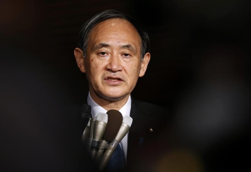 © Reuters. Japan's Chief Cabinet Secretary Suga speaks to the media at PM Abe's official residence in Tokyo