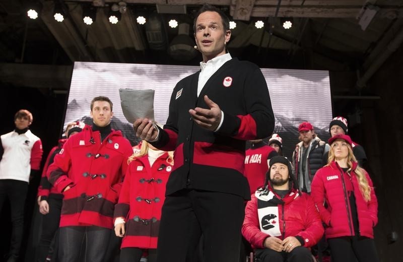 © Reuters. Canada's assistant Chef de Mission Brassard speaks during the unveiling of the Canadian Olympic and Paralympic team clothing in Toronto