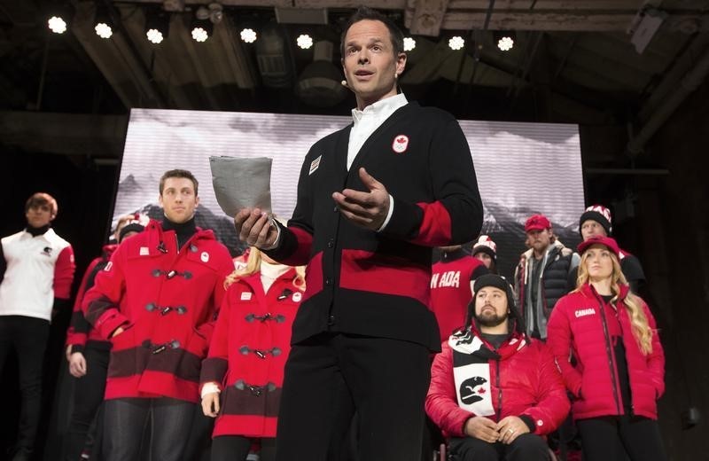 © Reuters. Brassard speaks during the unveiling of the Canadian Olympic and Paralympic team clothing in Toronto