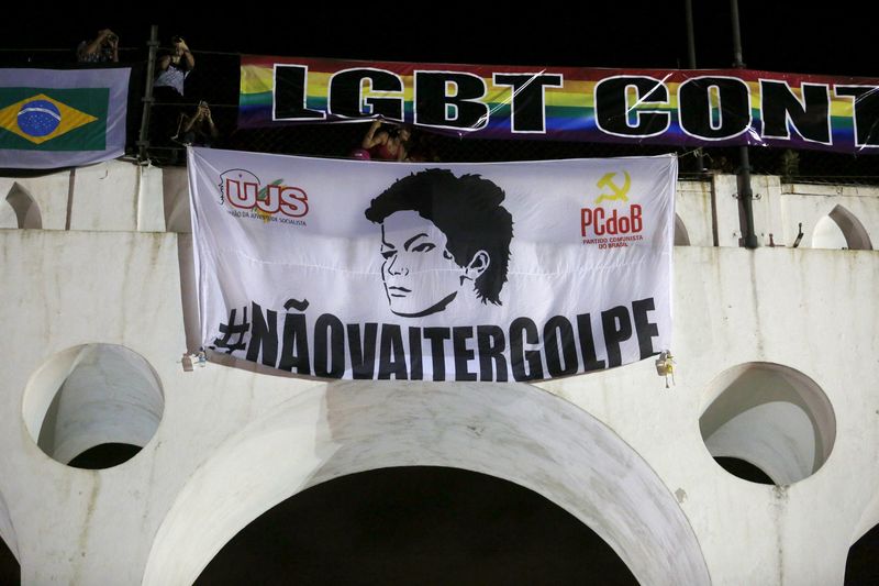 © Reuters. A banner with the image of Brazilian President Dilma Rousseff is displayed during a protest against her impeachment in Rio de Janeiro