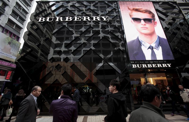 © Reuters. File photo of people walking outside a Burberry store in Hong Kong