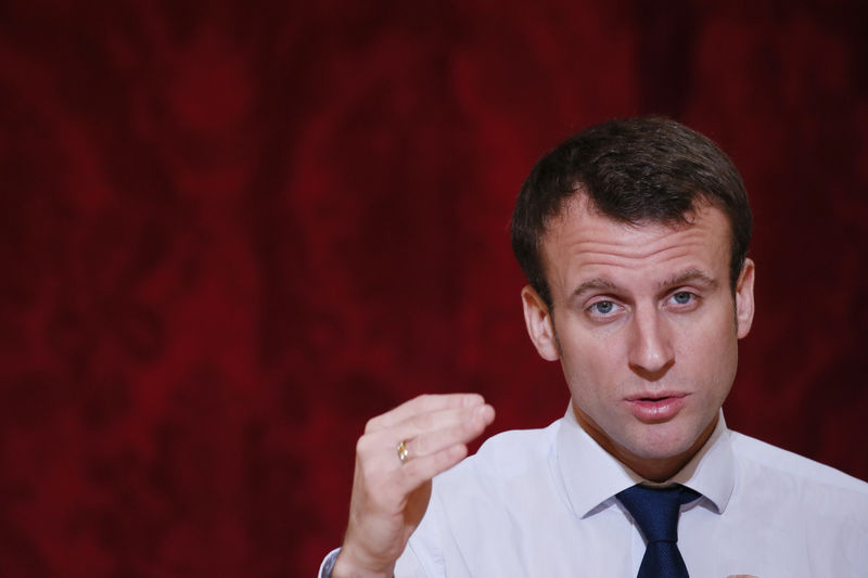 © Reuters. French Economy Minister Macron attends a meeting with a group of International CEO's during a Strategic Attractiveness Council at the Elysee Palace