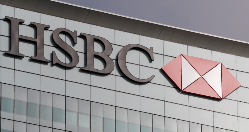 © Reuters. The HSBC logo is seen at their offices at Canary Wharf financial district in London