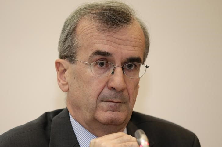 © Reuters. Banque de France Governor Francois Villeroy de Galhau listens to questions during a news conference at the French national bank in Paris