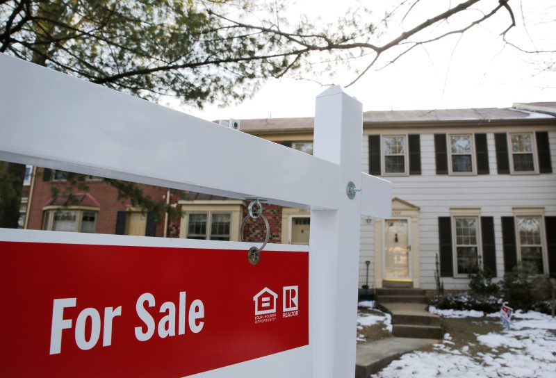 © Reuters. Home for sale sign hangs in front of a house in Oakton, on the day the National Association of Realtors issues its Pending Home Sales for February report, in Virginia