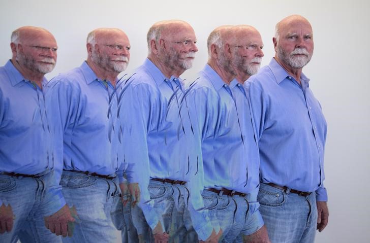 © Reuters. Genetic researcher Craig Venter is shown with a multiple camera exposure in his office in La Jolla