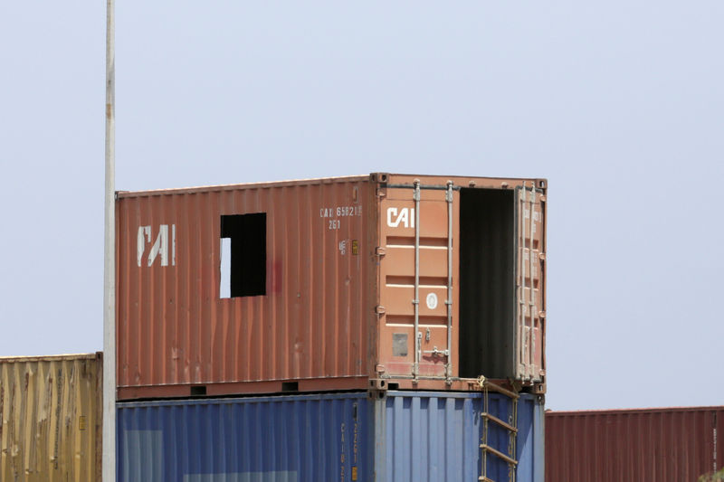 © Reuters. Shipping containers are seen stacked at a lot near Puerto Cabello port, in Puerto Cabello