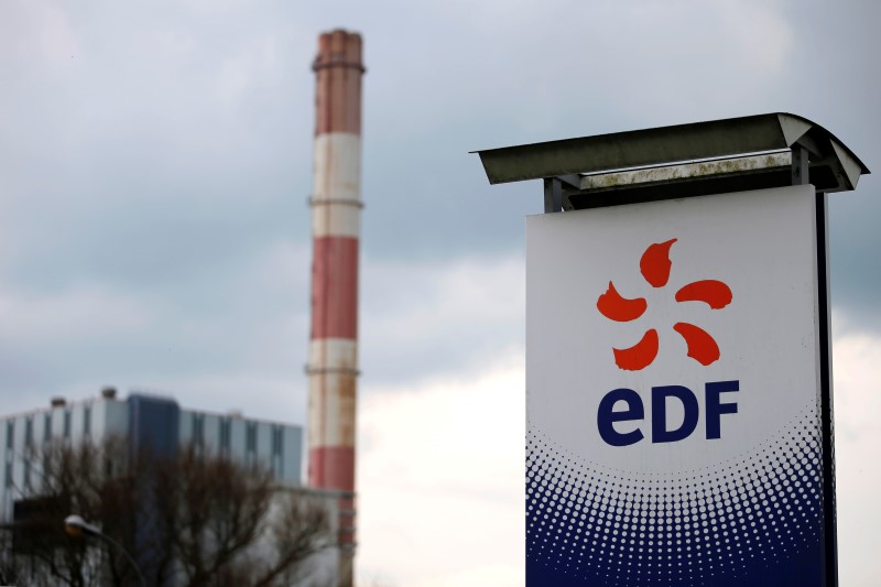 © Reuters. The logo of France's state-owned electricity company EDF is seen next to the Electricite de France (EDF) thermal electricity production plant in Cordemais