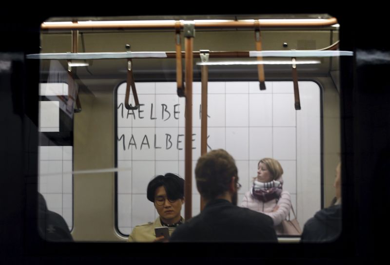 © Reuters. Passengers are pictured at Maelbeek metro station in Brussels,