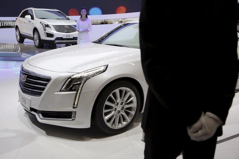 © Reuters. The Cadillac XT5 and CT6 are presented during Auto China 2016 auto show in Beijing