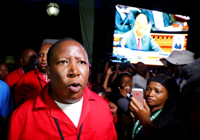 © Reuters. Economic Freedom Fighters leader Malema leaves the parliament after being ordered to do so during President Jacob Zuma's State of the Nation address in Cape Town