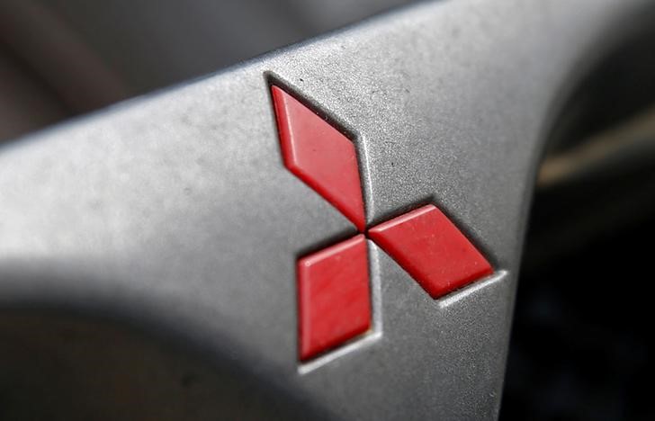 © Reuters. Mitsubishi logo are seen on the hood mask in this picture illustration taken