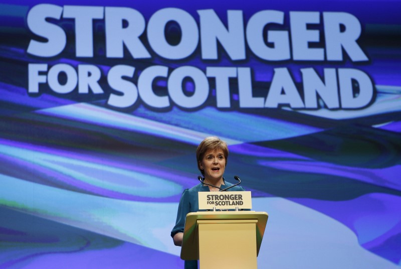 © Reuters. Scotland's First Minister and leader of the Scottish National Party Nicola Sturgeon delivers her speech during the party's annual conference in Aberdeen, Scotland 