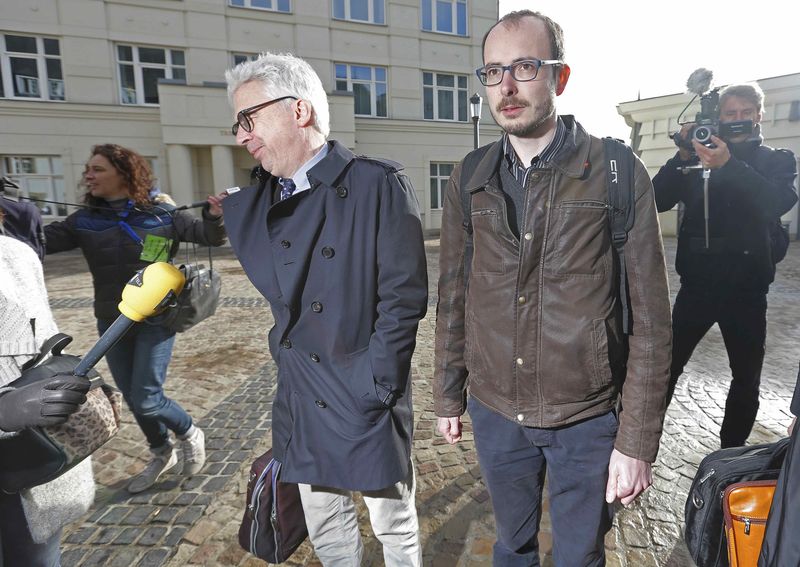 © Reuters. Former PwC employee Deltour and his lawyer Bourdon arrive at the court for the start of the LuxLeaks trial in Luxembourg