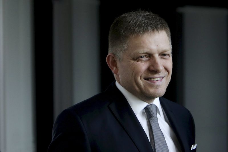 © Reuters. File photo of Slovakia's Prime Minister and leader of Smer party Robert Fico leaving after a live broadcast of a debate after the country's parliamentary election, in Bratislava