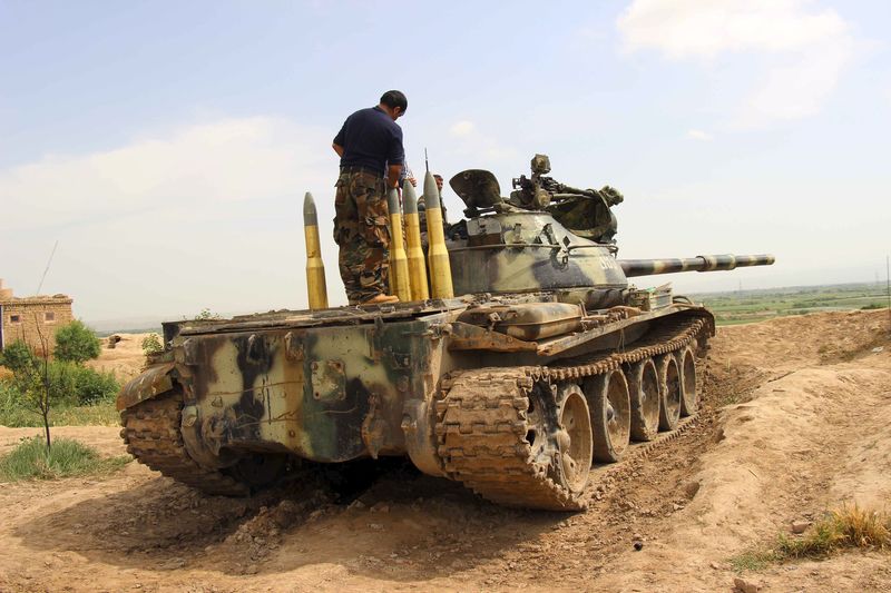 © Reuters. An Afghan National Army (ANA) tank is parked at an outpost in Kunduz province