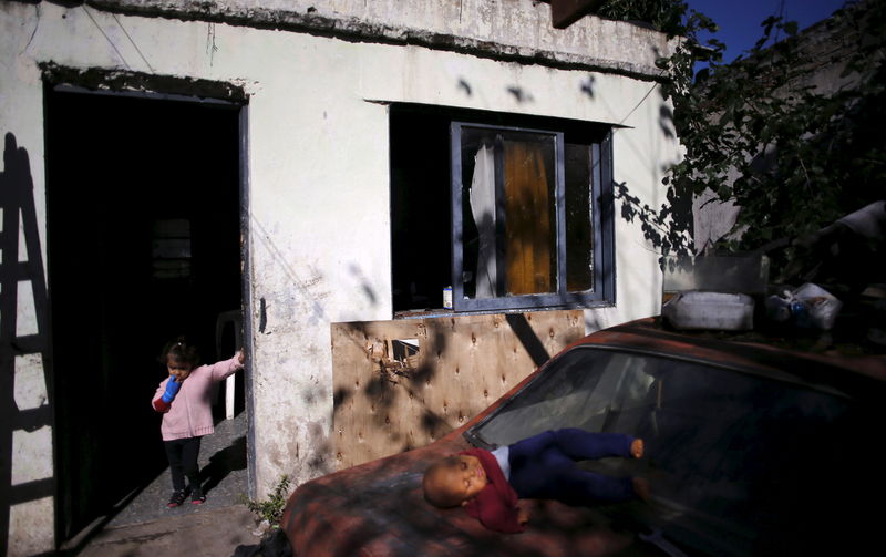 © Reuters. Mia Duarte stands at her house in Hurlingham, on the outskirts of Buenos Aires