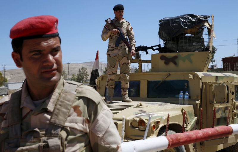 © Reuters. الجيش العراقي يحرز تقدما متواضعا جنوبي الموصل
